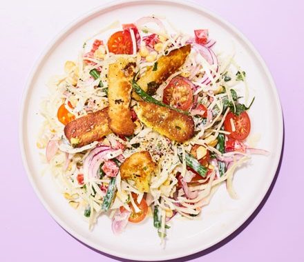 Cumin-spiced halloumi with corn & tomato slaw recipe