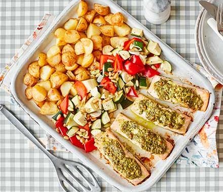 Salmon pesto traybake with baby roast potatoes recipe