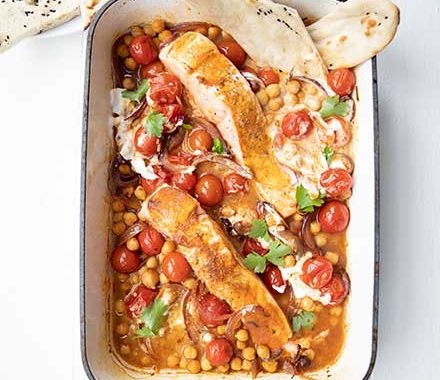 Spiced salmon & tomato traybake recipe