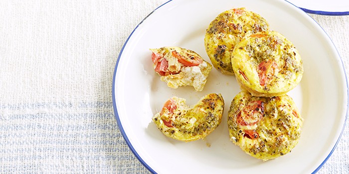 Pesto egg muffin bites on a white plate