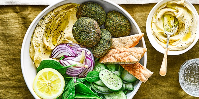 Spinach falafel & hummus bowl with pitta, cucumber and spinach