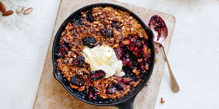 Blackberry and apple oat bake with ice cream