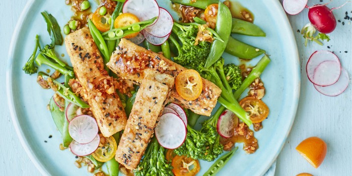 Broccoli and snap peas topped with crispy tofu
