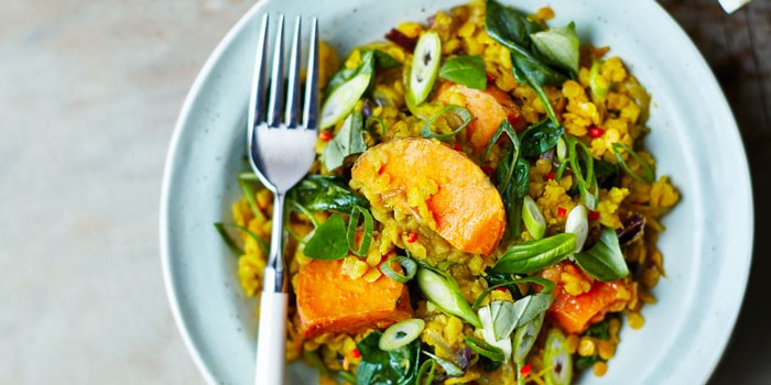 Spinach, sweet potato & lentil dahl with a fork