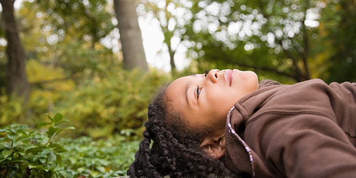 Child breathing in while lying down