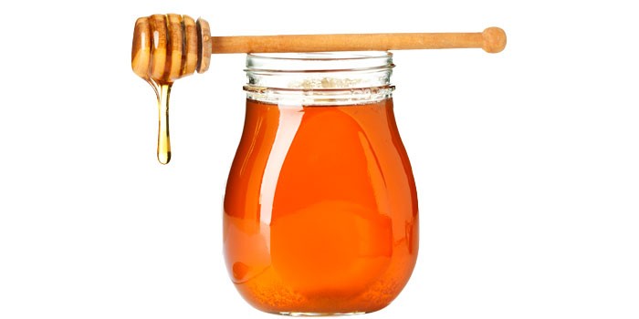 Jar of honey and twizzler