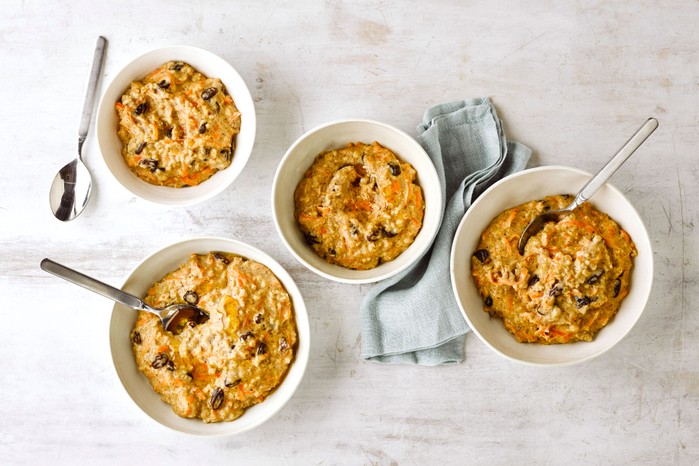 Multiple bowls of carrot cake porridge