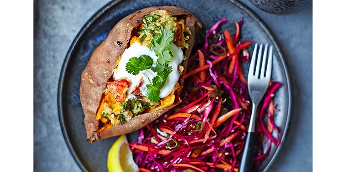 Baked sweet potatoes with lentils & red cabbage slaw