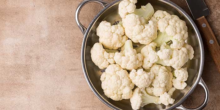 Cauliflower pieces in a colander