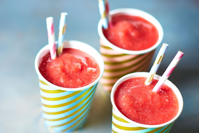 Three cups of watermelon and strawberry slushie