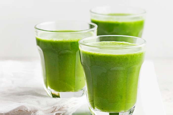 Three glasses of green smoothie