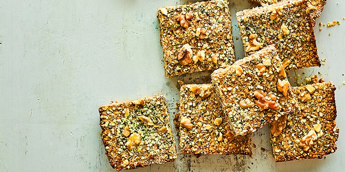 Healthy vegan date & walnut flapjacks cut into squares