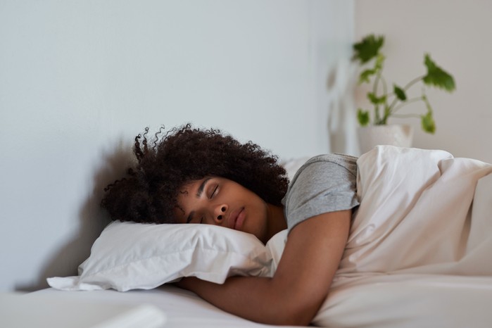 Woman asleep in bed