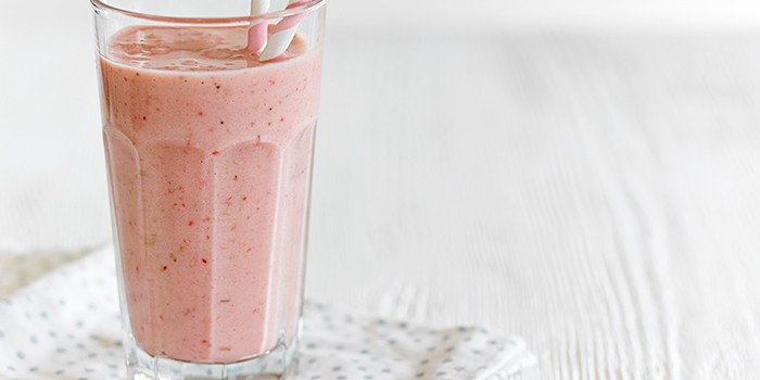 Strawberry and banana almond smoothie in a glass