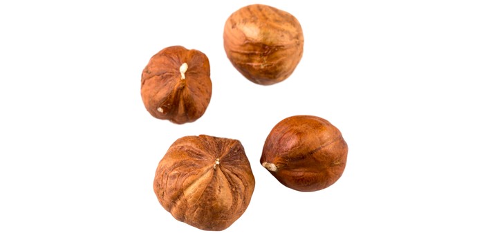 hazelnuts on a white background