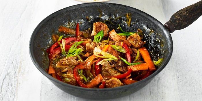 Lighter sweet and sour pork in a wok