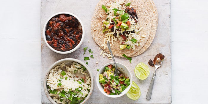 Healthier Mexican burritos with beans and grated cheese