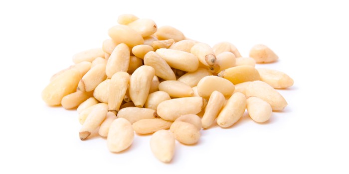 pine nuts on a white background