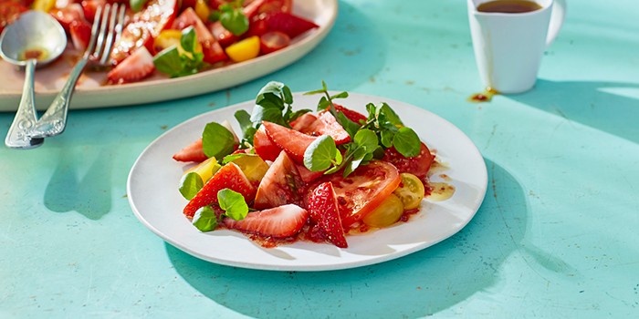 Strawberry, tomato and watercress salad with honey and pink pepper dressing