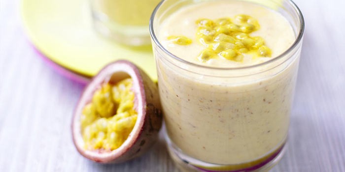 Mango and coconut smoothie in a glass