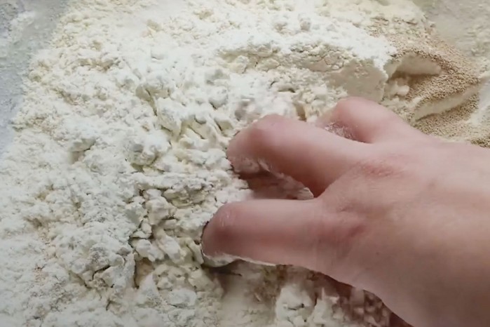 Hand mixing flour