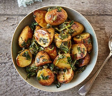 Baked new potatoes with wilted wild garlic recipe