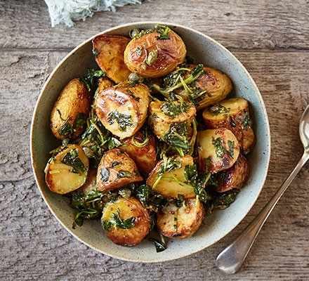 Baked new potatoes with wilted wild garlic recipe 