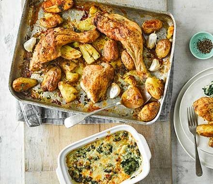 Roast chicken with squashed new potatoes & cheesy creamed spinach recipe