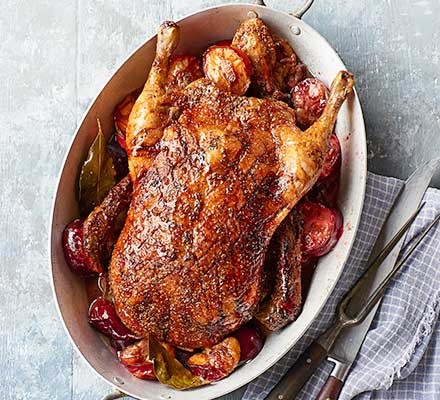 Roast spiced duck with plums recipe 