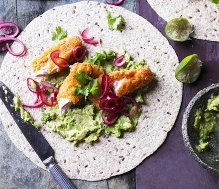 Smashed avocado with crispy chicken, pickled onions & tortillas recipe