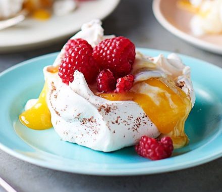 Star anise meringues with mango coulis & raspberries recipe