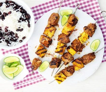 Jerk pork & pineapple skewers with black beans & rice recipe