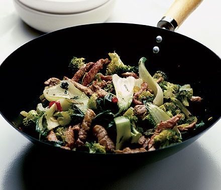 Spiced pork with stir-fried greens recipe