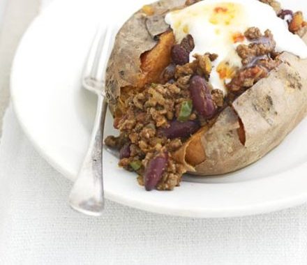 Baked sweet potatoes with easy chilli & soured cream recipe