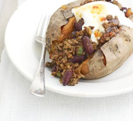 Baked sweet potatoes with easy chilli & soured cream recipe 