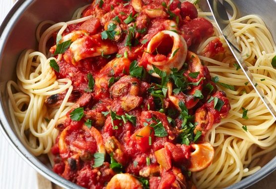 Spaghetti with smoky tomato & seafood sauce recipe