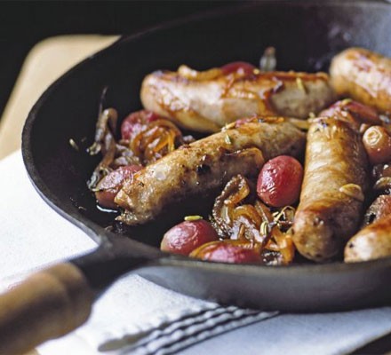 Sticky pan-roasted sausages with grapes recipe 