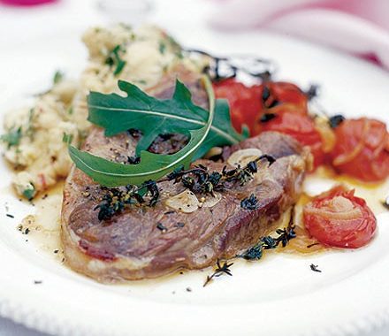 Marinated lamb steaks with paprika roast tomatoes & butterbean smash recipe