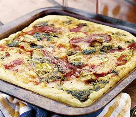 Pesto pizza with artichokes & prosciutto recipe