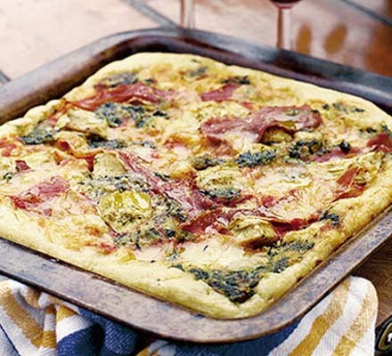 Pesto pizza with artichokes & prosciutto recipe 