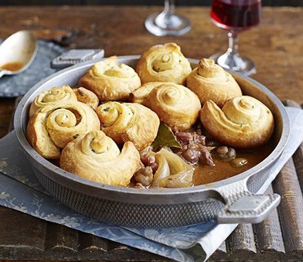Coq au vin with garlic croissant puffs recipe