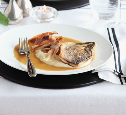 Roast fillet of sea bass with parsnip purée & caramelised garlic recipe 