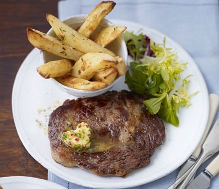 Rib-eye steaks with chilli butter & homemade chips recipe