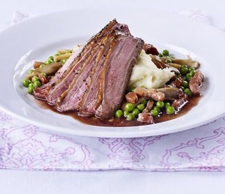 Peppered duck with vanilla mash, pea & wild mushroom ragout recipe