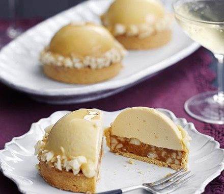 Caramelised white chocolate, ginger caramel & macadamia tarts recipe