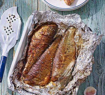 Hot tea-smoked trout with new potato & rocket salad recipe 