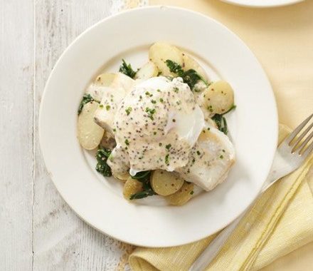 Smoked haddock with buttered spinach & mustard sauce recipe