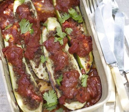 Baked courgettes stuffed with spiced lamb & tomato sauce recipe