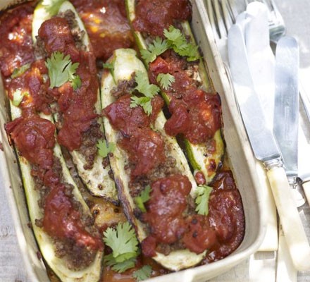 Baked courgettes stuffed with spiced lamb & tomato sauce recipe 