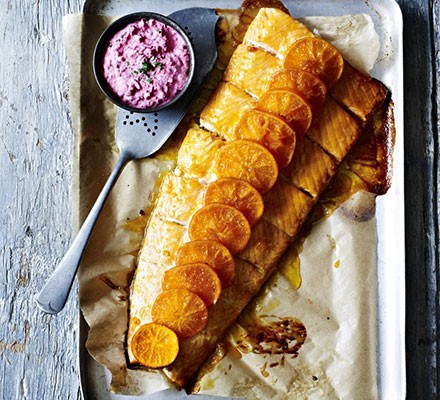 Clementine & vodka-baked salmon with beetroot crème fraîche sauce recipe 